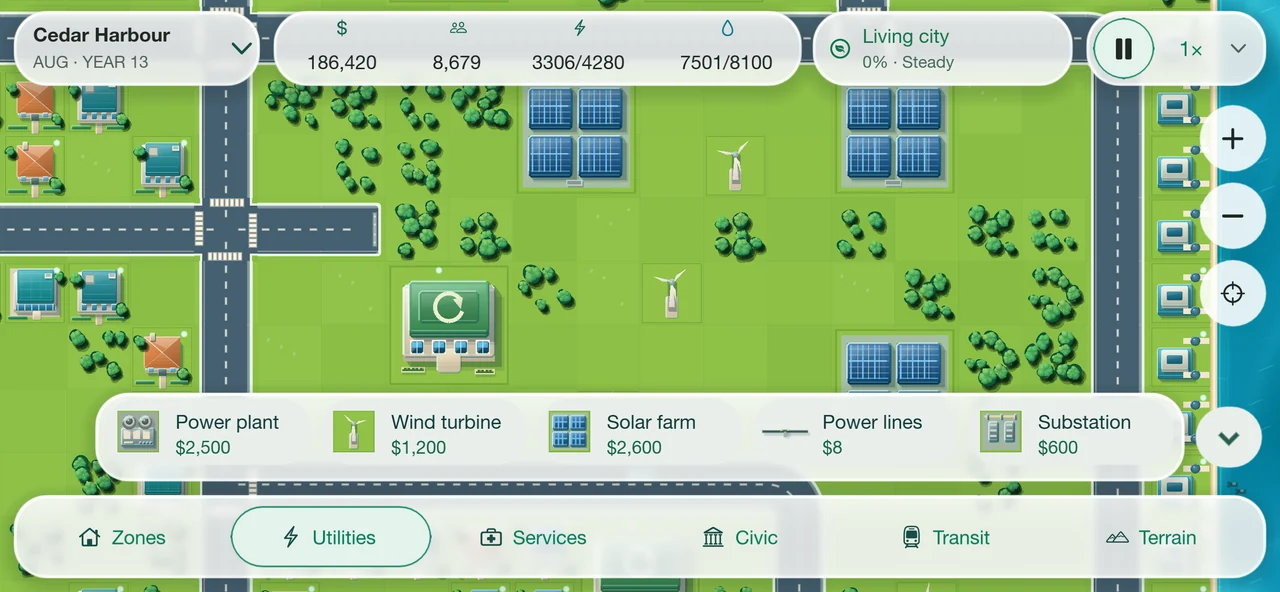 Actual Verdant City gameplay showing wind turbines, solar farms and the optional CO₂e indicator